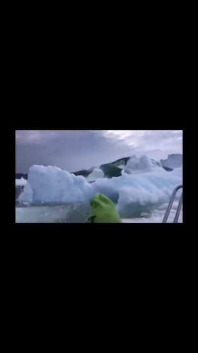 Men escaping a iceberg tsunami