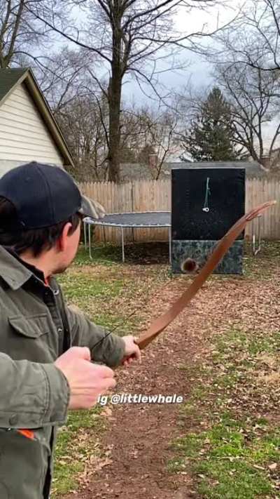 Swinging pvc pipe and carnival ring pin with a recurve bow