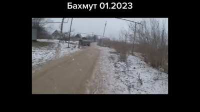 Ukrainian troops supported by a Humvee engaging a Russian position in the outskirts of Bakhmut