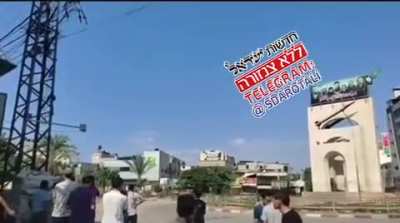Idf airstrike in gaza,the crowd who waiting for the strike is an evidence that idf warning before they bomb