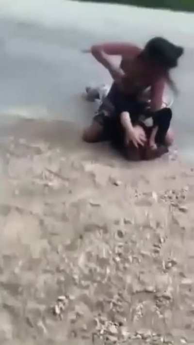 Camo shorts chick dominates the opposition… rough ground & pound
