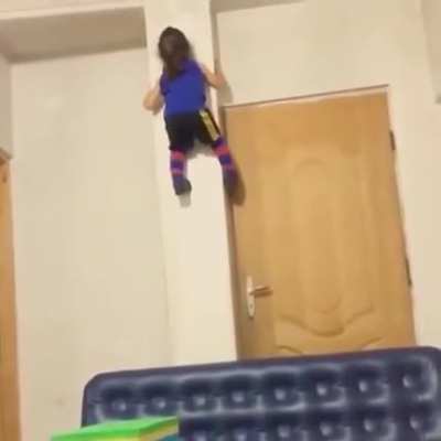 She climbs the wall with no rocks!