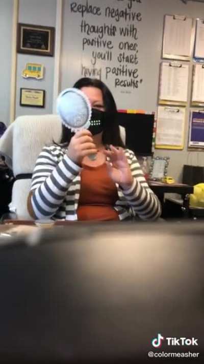 This lady + an LED facemask = a good time.