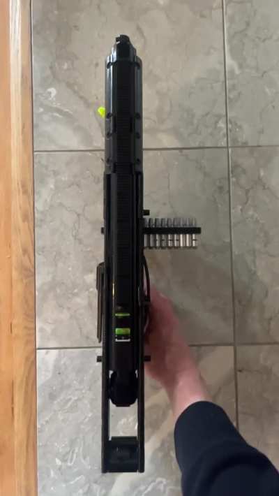HK inspired SMG.  1,100 rounds/min