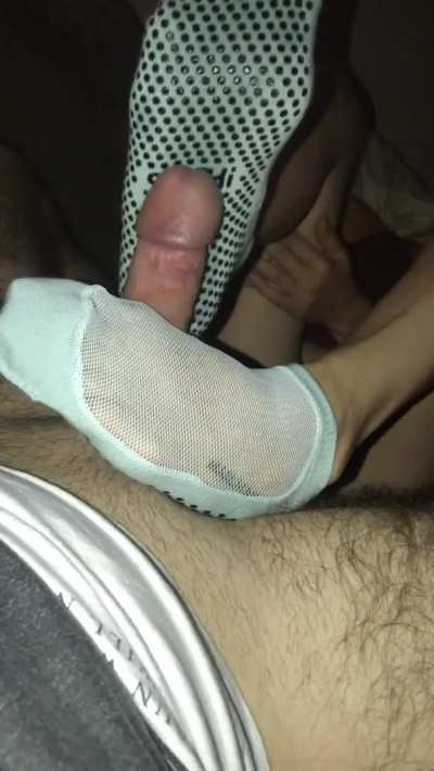 getting a footjob from a girl wearing the psych ward grippy socks