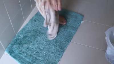 using someone else's towel (credit to Fairbairn Films)
