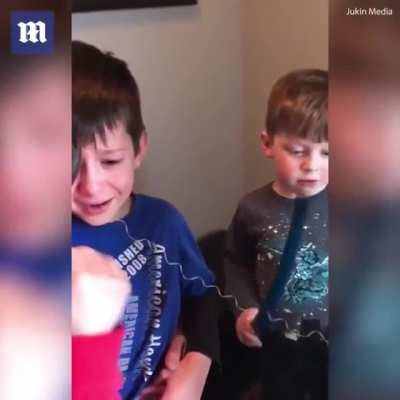 Parents trying to pull out boy's tooth