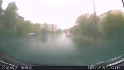 10 years old boy in Russia, drives a car with his 4 years old sister