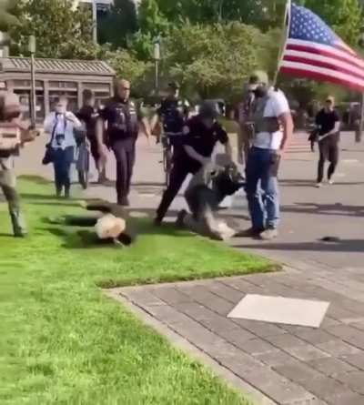 That cop was an inch from getting knocked out