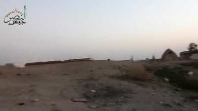 GoPro wearing al-Nasar Army fighters story the SAA controlled village of al-Khawayn, Idlib - 2018