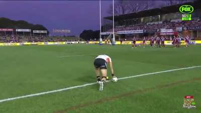 Fan has some fun with Adam Doueihi as he is kicking for goal