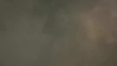 Triangle thing behind cloud in China