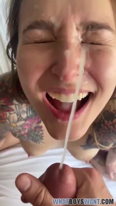 Pretty girl takes facial cumshot