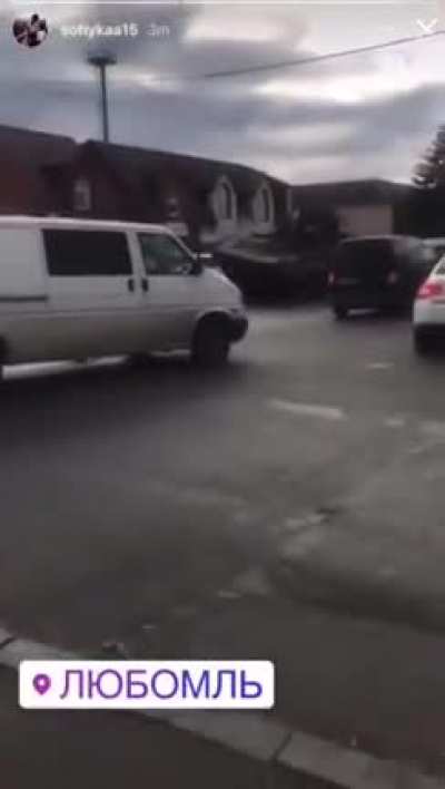 Russian tanks drives over a civilian trying to escape