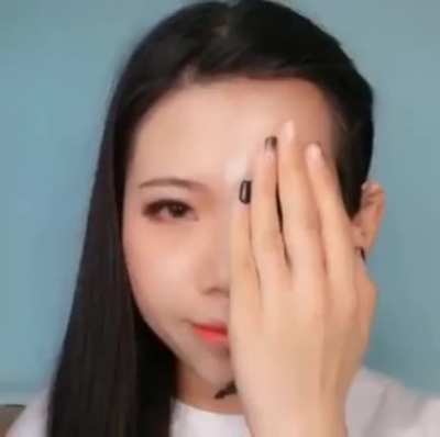 This make up artist combining, half of her face and half digital picture. Awesome!