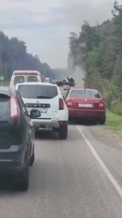 Russian Grad MLRS fires on Kharkiv oblast right from a public highway 