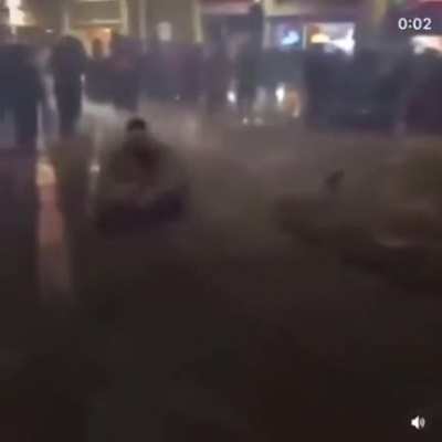 Woman approaches drifting car