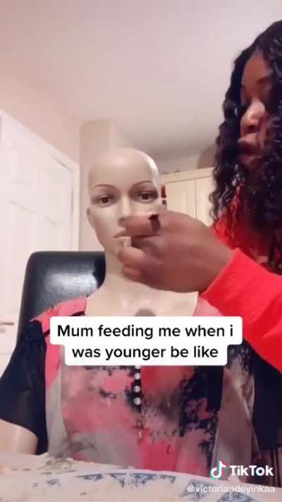Mum feeding me when I was younger be like