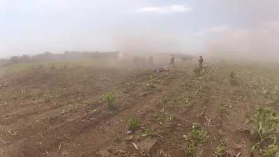 Ukrainian howitzer crews working on a 