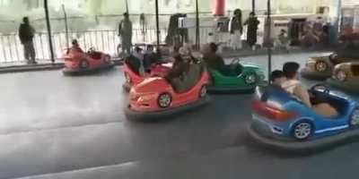 Taliban members enjoy amusement park in Kabul