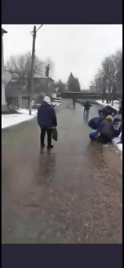 Ukrainian protester shot in the leg by Russian army.