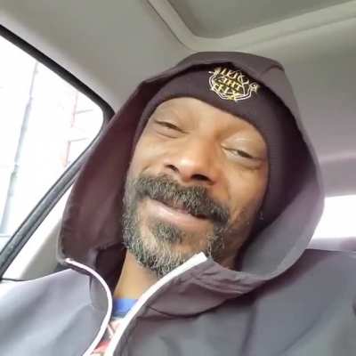Snoop listening to the Frozen soundtrack in his car