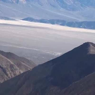 F15 flying low through a canyon