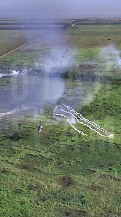 Unique drone footage of a Ukrainian Mi-24 attacking enemy positions in the Zaporizhzhia sector.