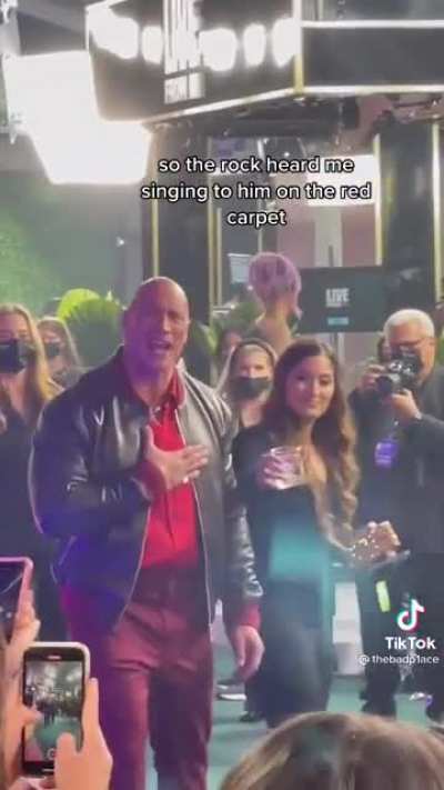 The Rock matches his fan's vibes