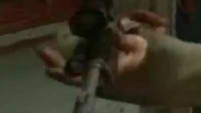 Nick reloads a gun