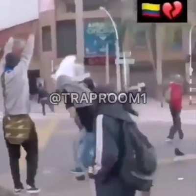 Colombian protester gets hit in the head by a police projectile
