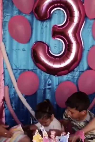 Girl gets her birthday candles blown out...