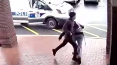 Armed man gets tripped by random bystander