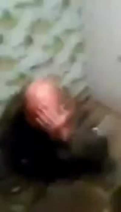 Russian try to break bottle with his head