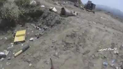 Houthi fighters assault a saudi position in Jizan border ,southern saudi Arabia, may 2021.