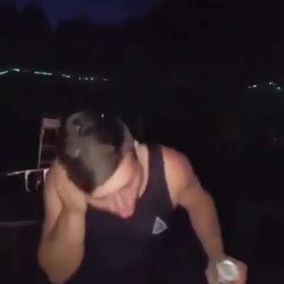 Breaking a glass bottle on your head