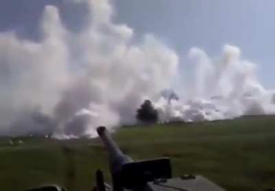 Tank deploying a smoke screen