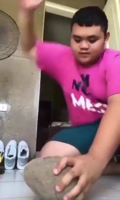 breaking a stone using bare hand
