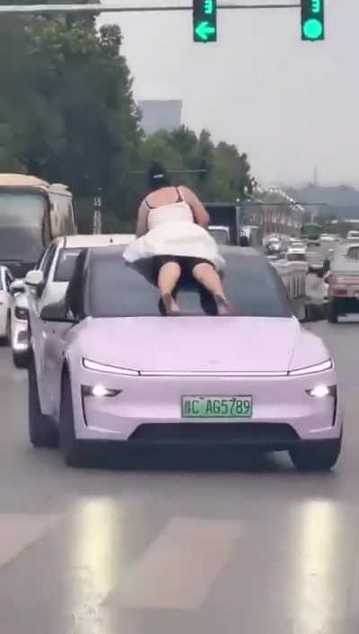 Woman hits car with crowbar