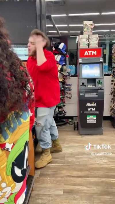 Gas station clerks from the East side get into it