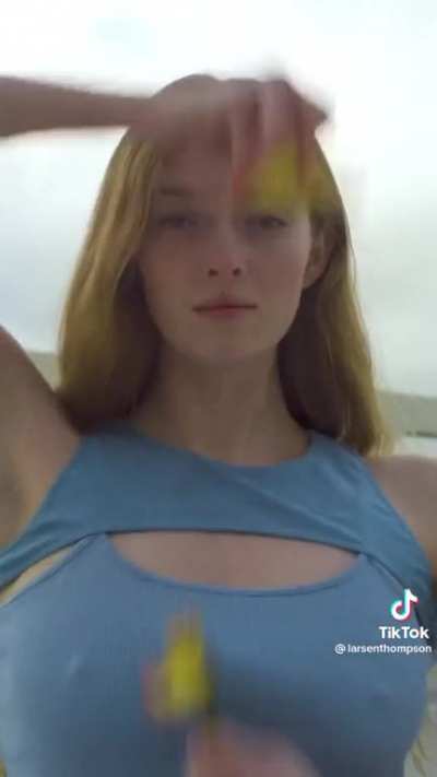 In a blue outfit