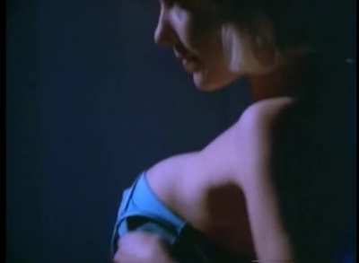 Julie K. Smith stripteases in moonlight - Midnight Tease II (1995)