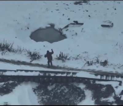 Different view on Russian soldier trying to evade FPV drone on icy ground, POV seen before in compilation