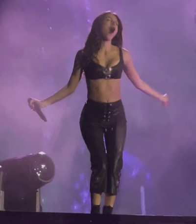 Shaking her tits