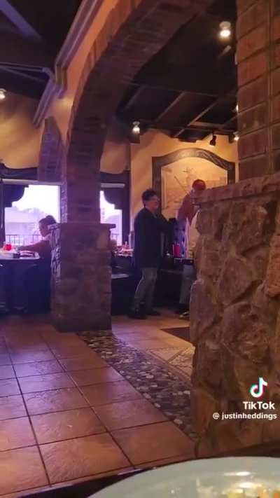 A Karen screams at a Trump supporter and his family in a restaurant before the cops take her away