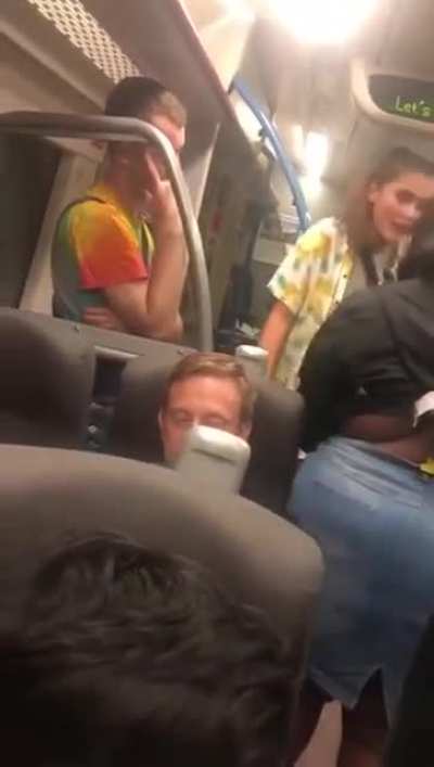 Apparently someone threw food at her? Fight on train.