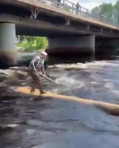 Loggers often ride a flotilla logs down the river