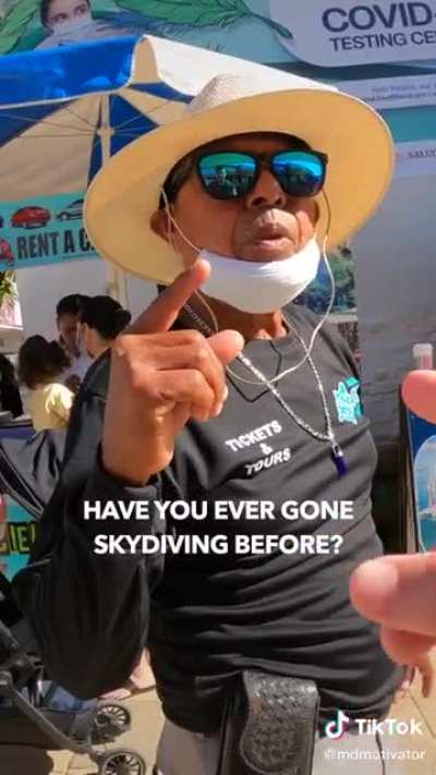 Asking strangers if they want to go sky diving for free