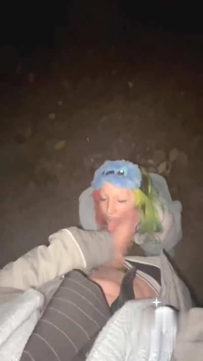 Blowing huge cock in a park