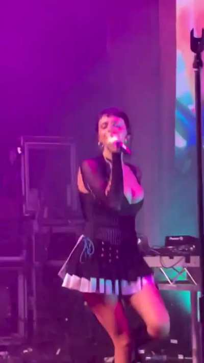 Rebecca Black Bouncing Around on Stage